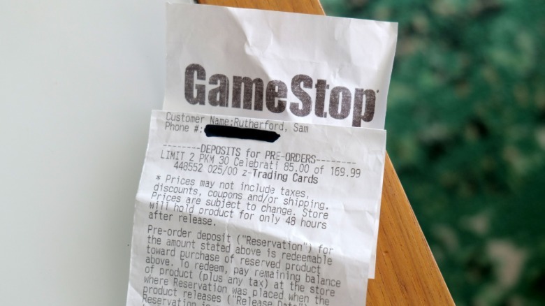 إيصال يوضح سعر 170 دولارًا لـ Pokemon ETB في Gamestop.